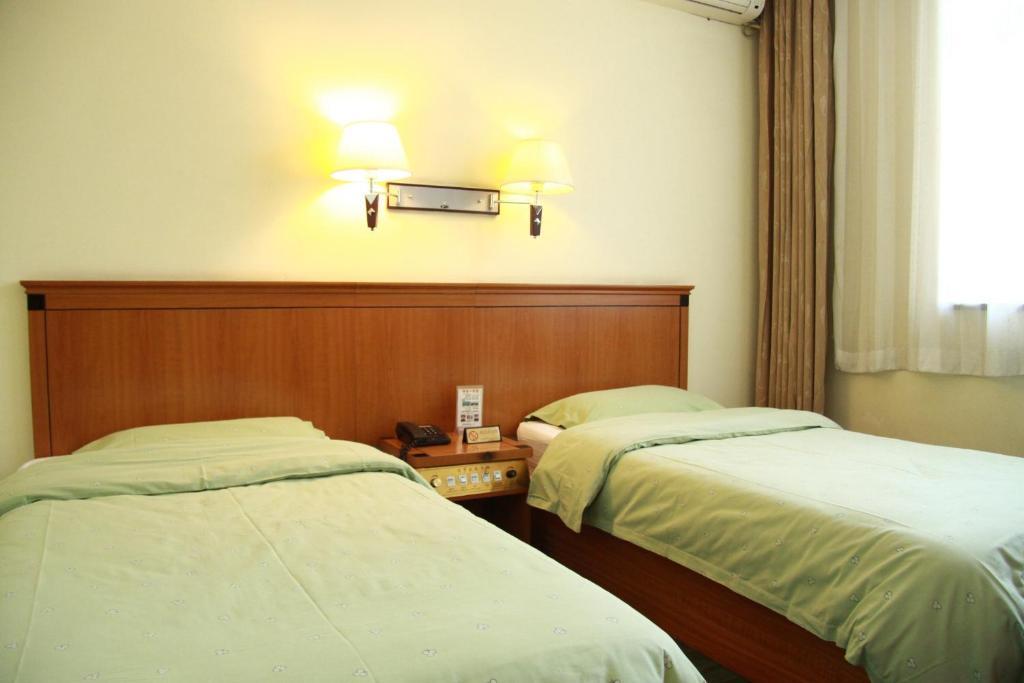 Beijing Fuxing Holiday Hotel Habitación foto