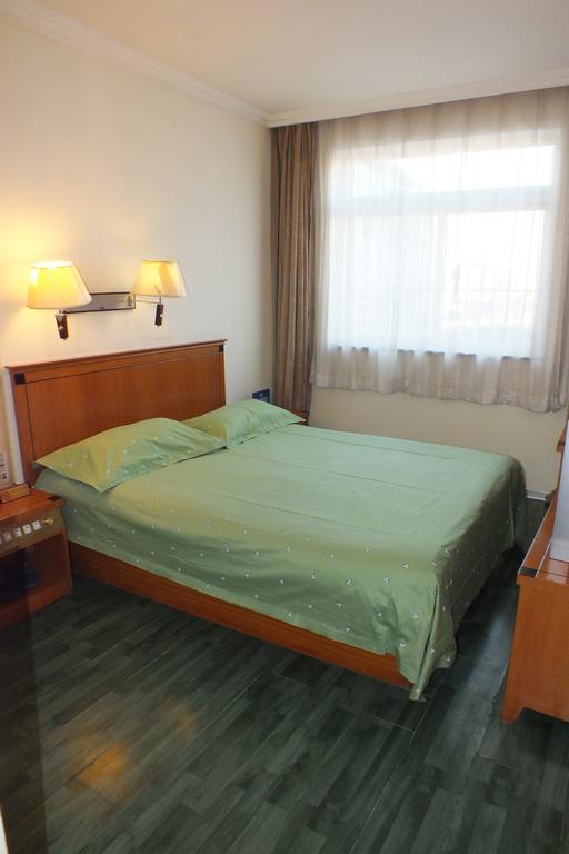 Beijing Fuxing Holiday Hotel Habitación foto