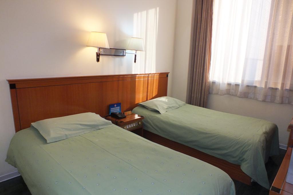 Beijing Fuxing Holiday Hotel Habitación foto