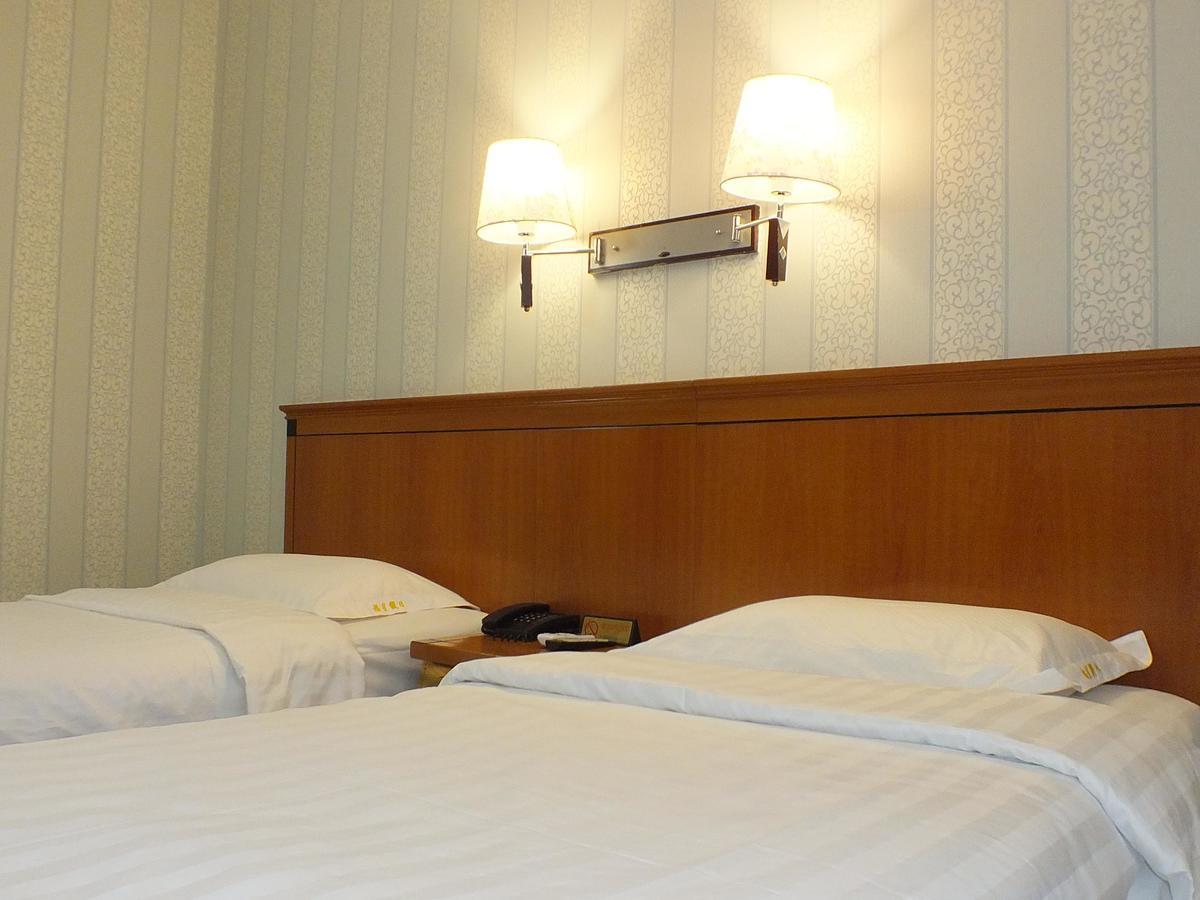Beijing Fuxing Holiday Hotel Habitación foto