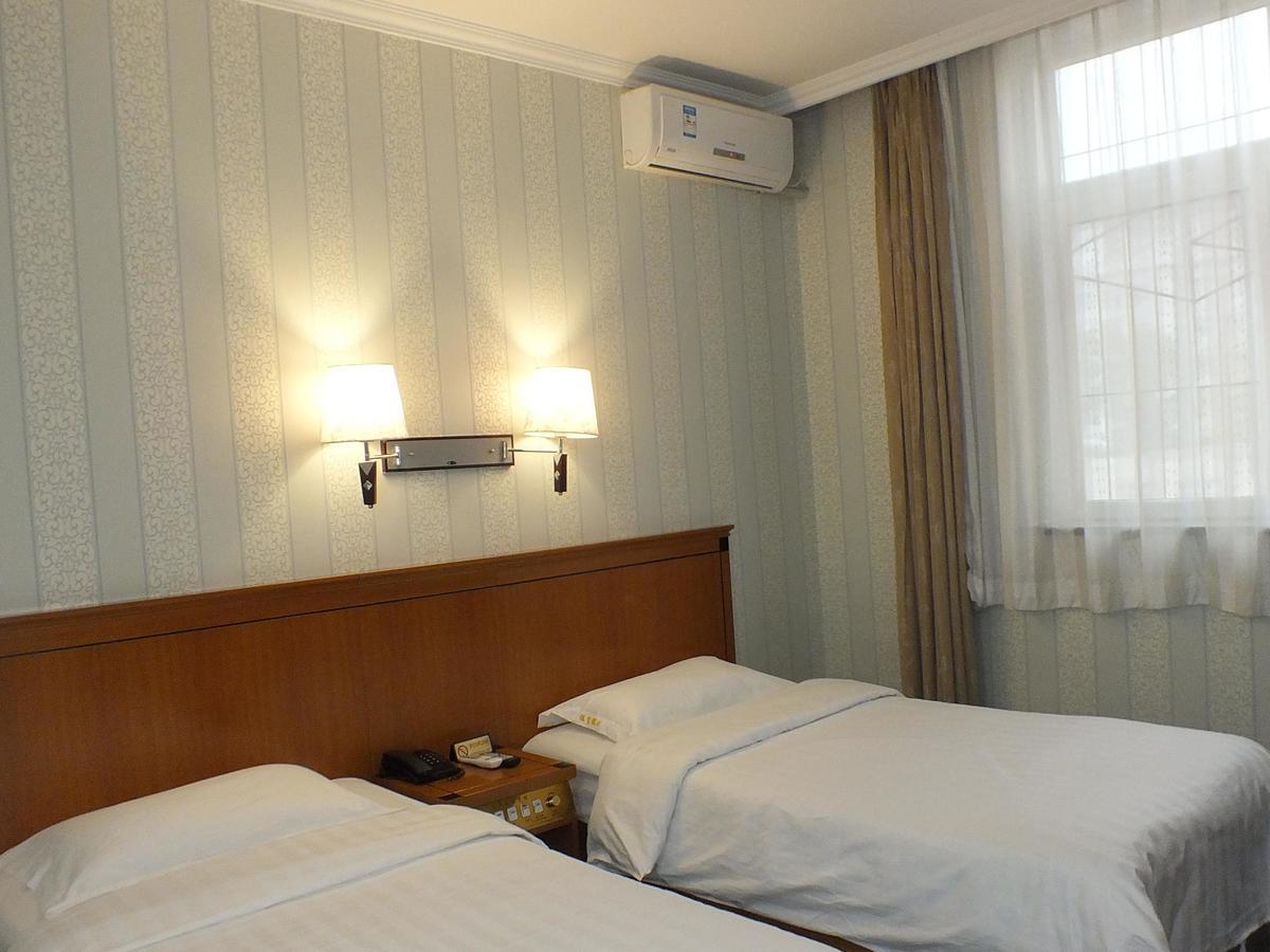 Beijing Fuxing Holiday Hotel Habitación foto